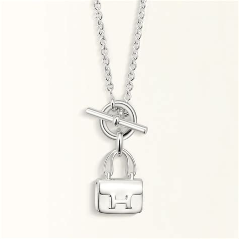 hermes constance necklace free shipping|HERMES Sterling Silver Constance Amulettes Pendant Necklace .